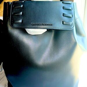 Armani Exchange backpack purse. Never used and still has tags.  Solid black.